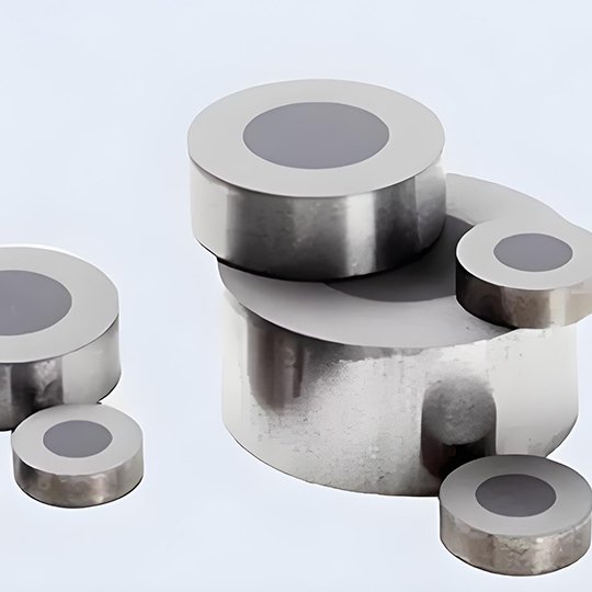 Tungsten carbide supported PCD blanks